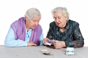 Two Grandma is counting Russian money.